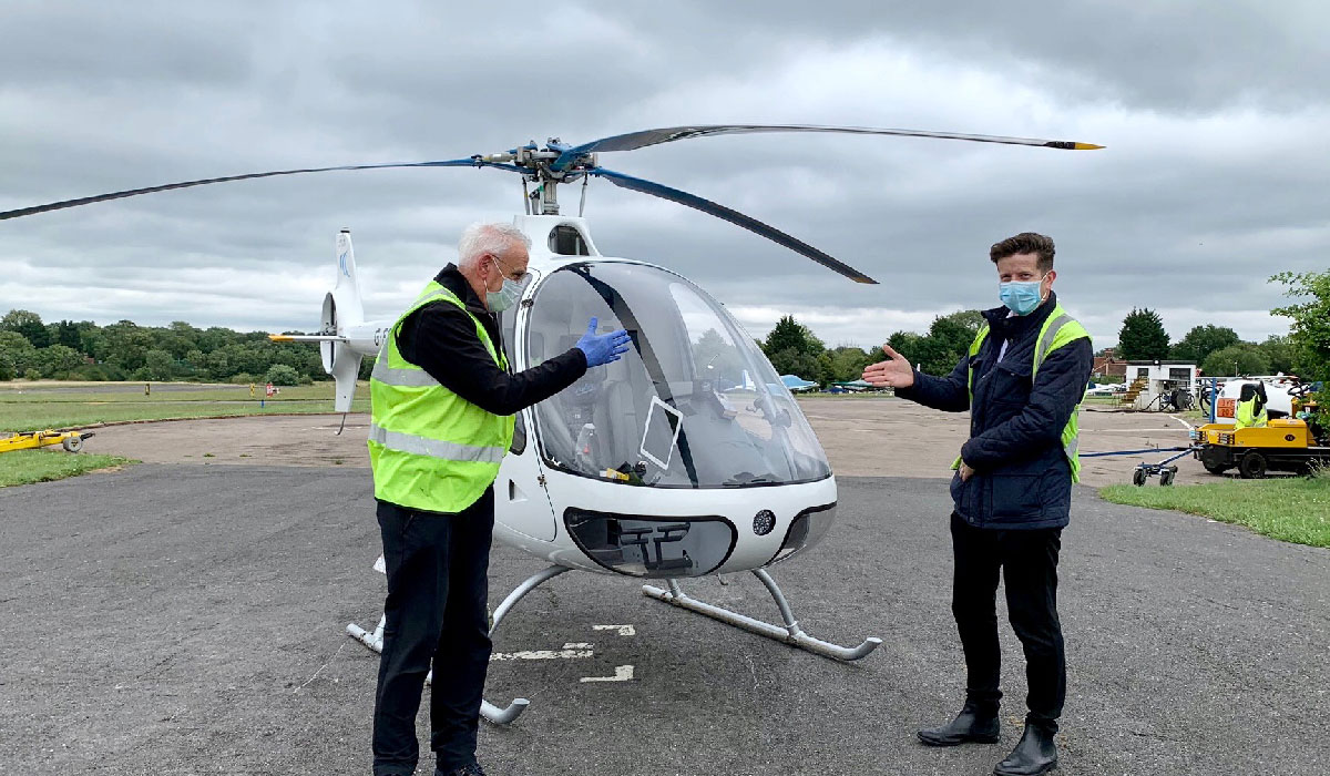Covid handshake by helicopter