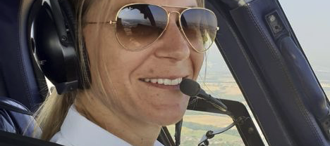 woman in helicopter