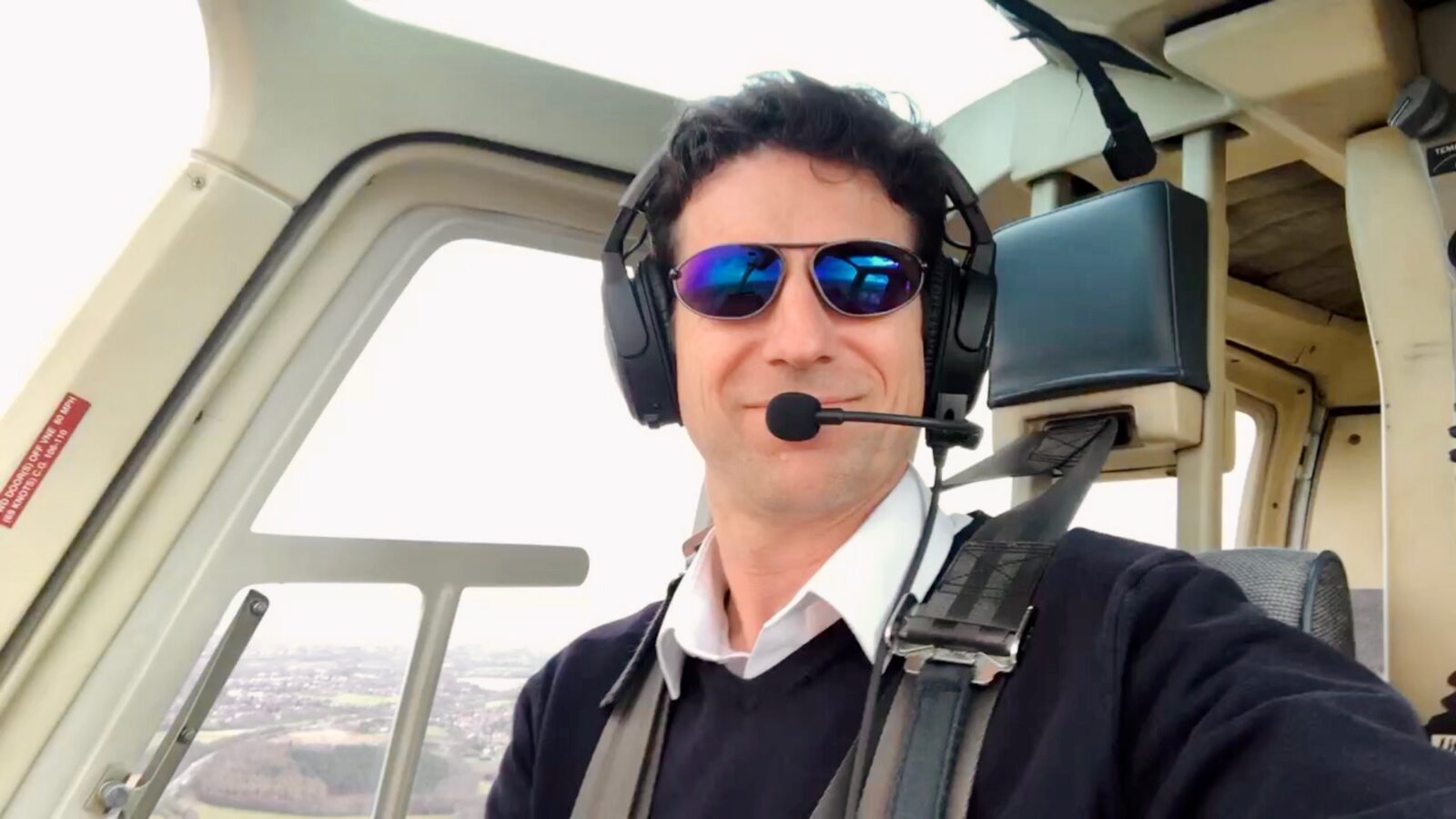 Person sitting in helicopter